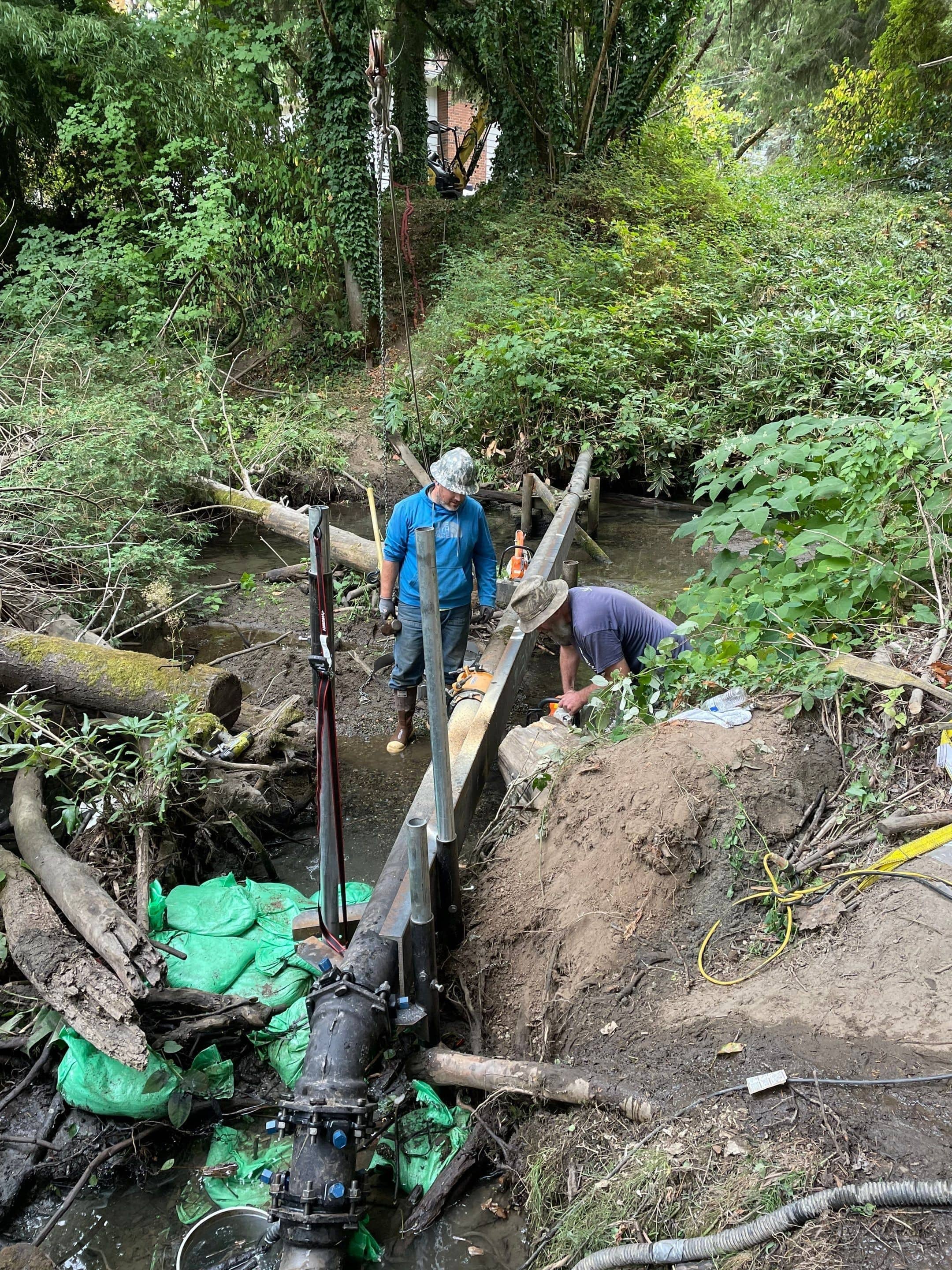  Installation of new sewer line with custom fabricated supports
