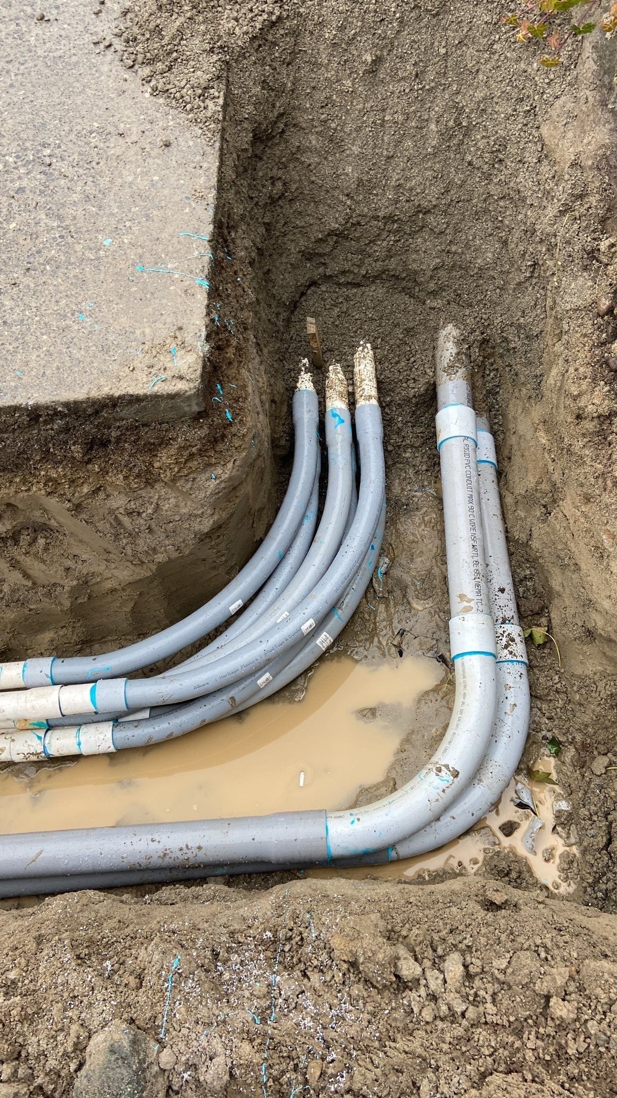 Multiple utility conduits are labeled.