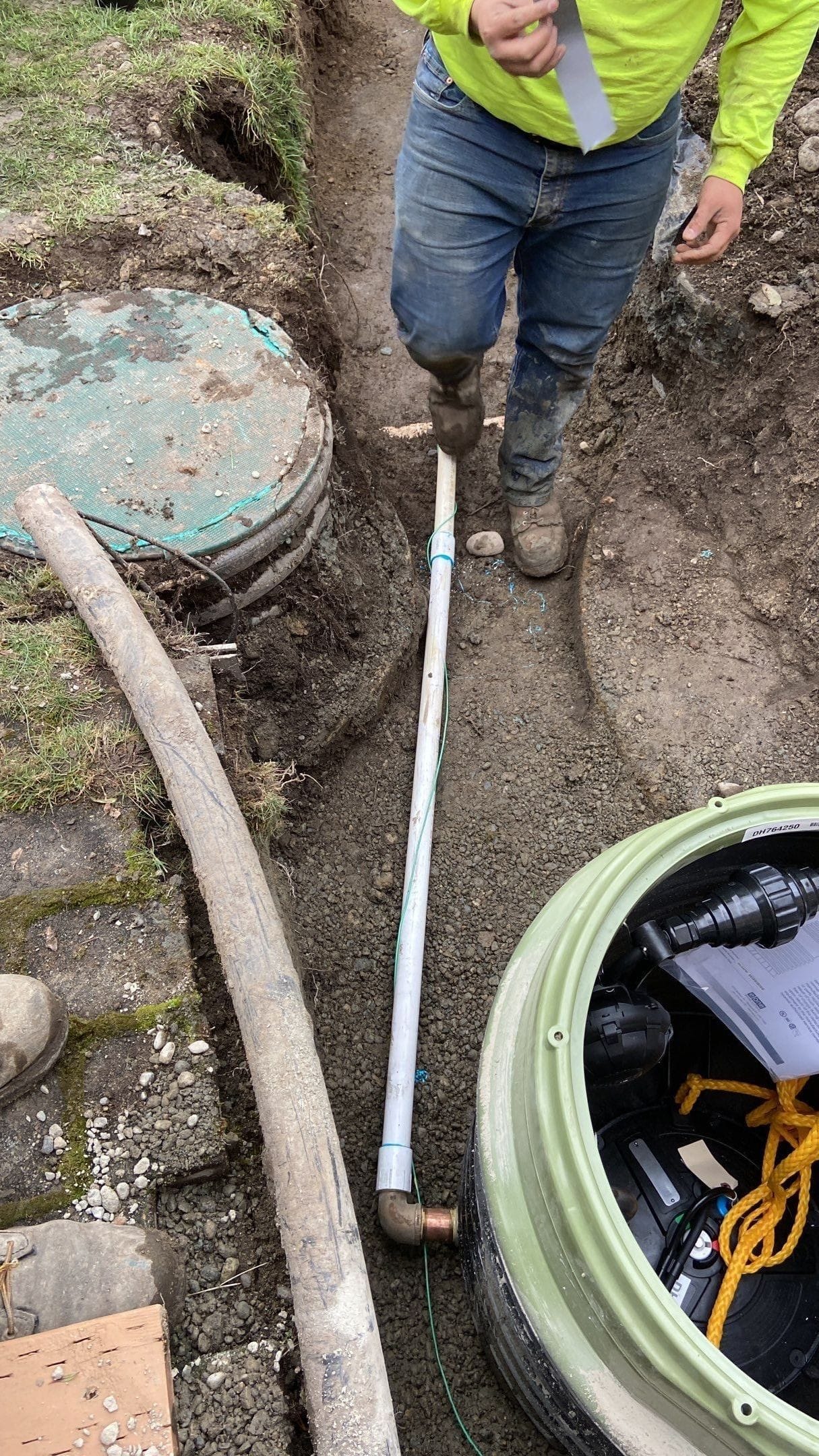 Exit pipe for sewer grinder pump after hand-digging. 