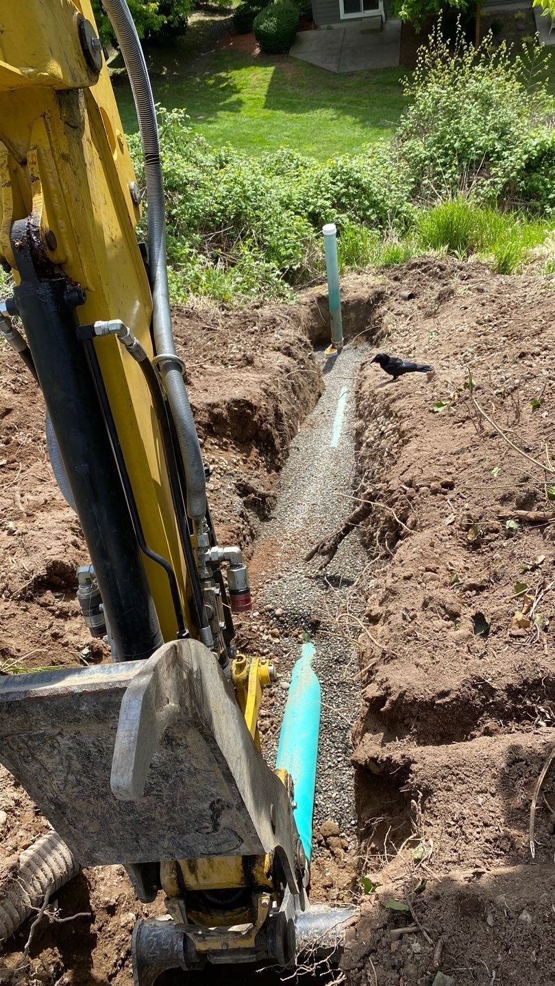 Pipe is bedded in and ready for burial and landscaping.